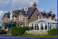 a view of the Blackwaterfoot Lodge with the conservatory