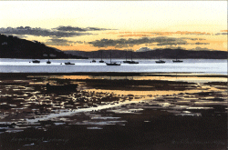 Sailing yachts and other vessels in Lochranza Bay at sunset